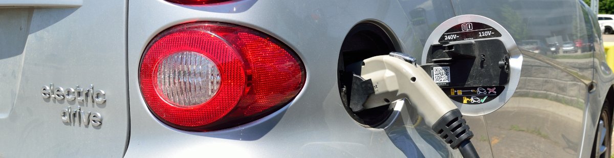 Car is getting petrol from station Car is fueling up