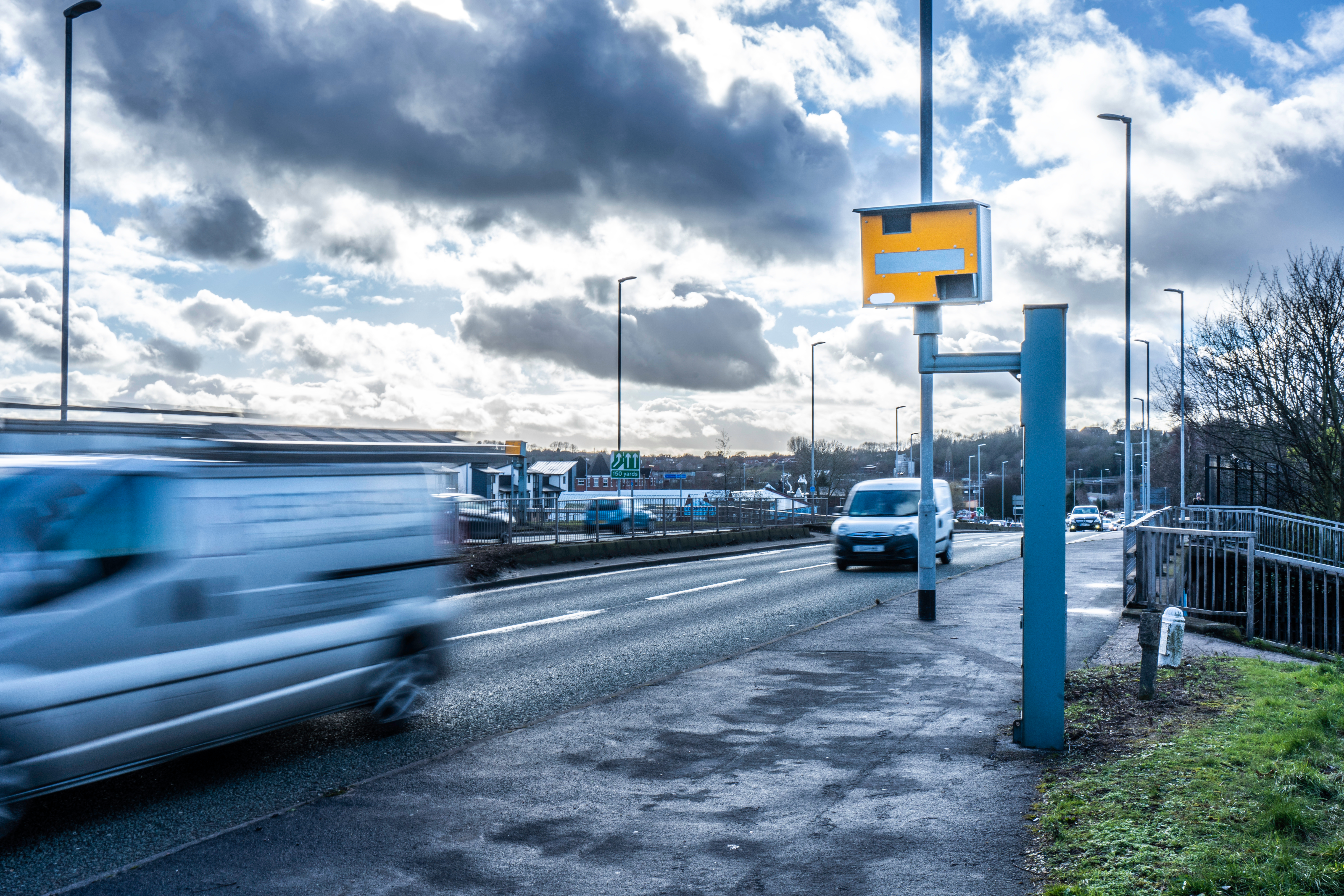 Cars passing a speed camera speed camera