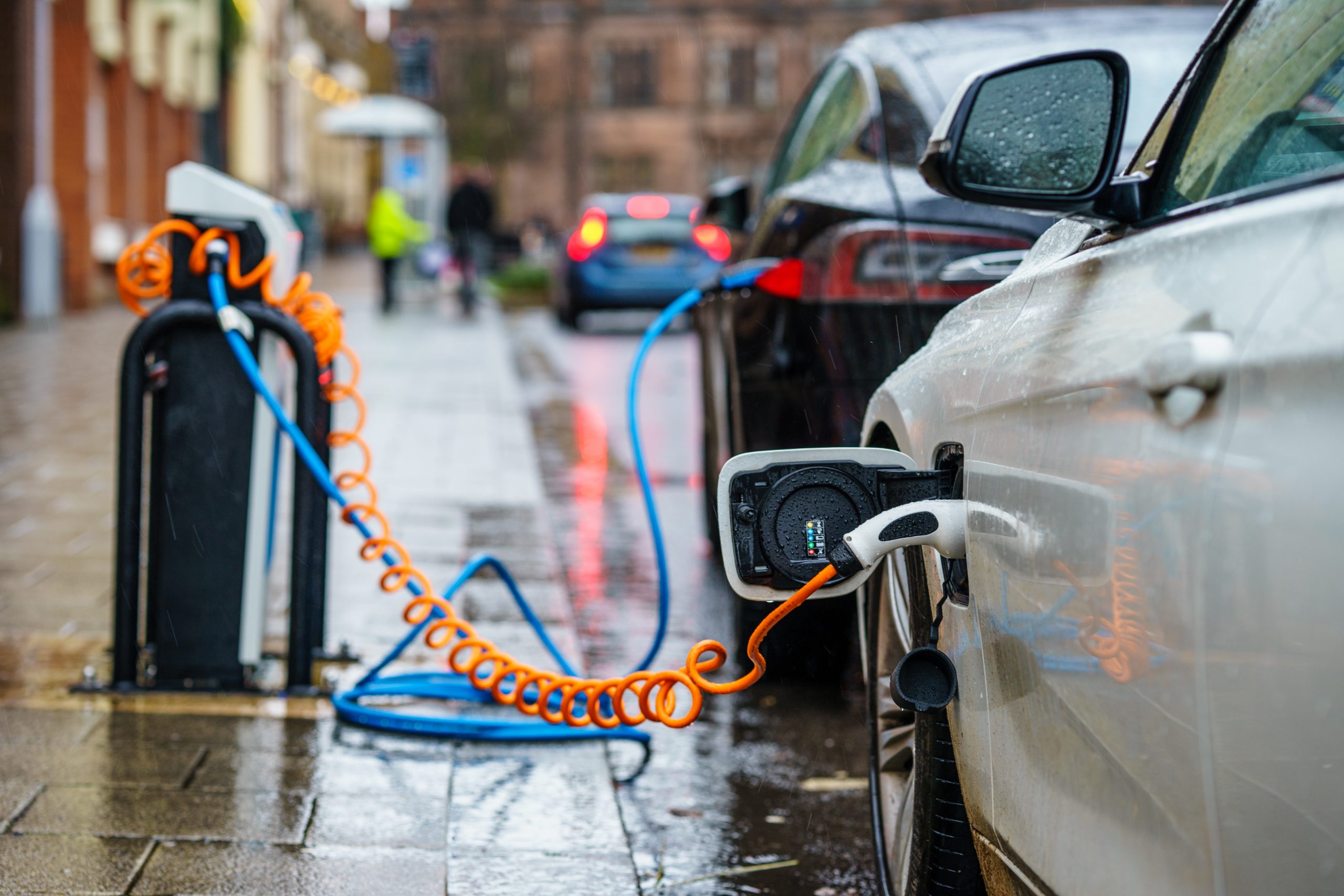 Electric vehicles charging via on-street charging point