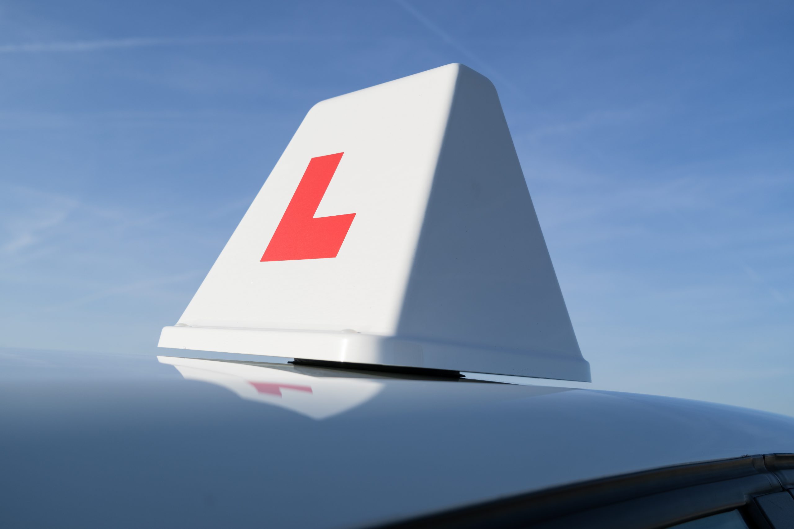 Learner driver sign on top of car